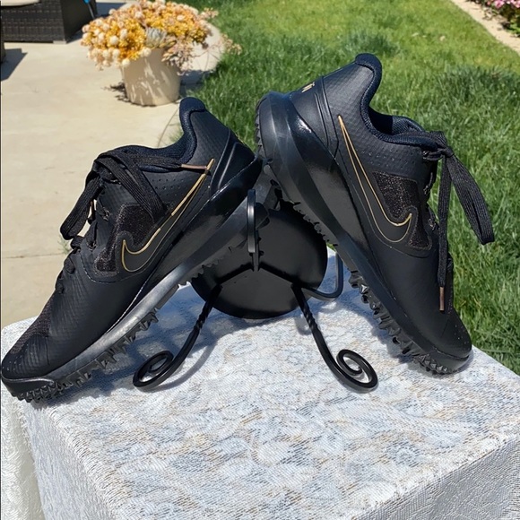 tiger woods golf shoes black and gold